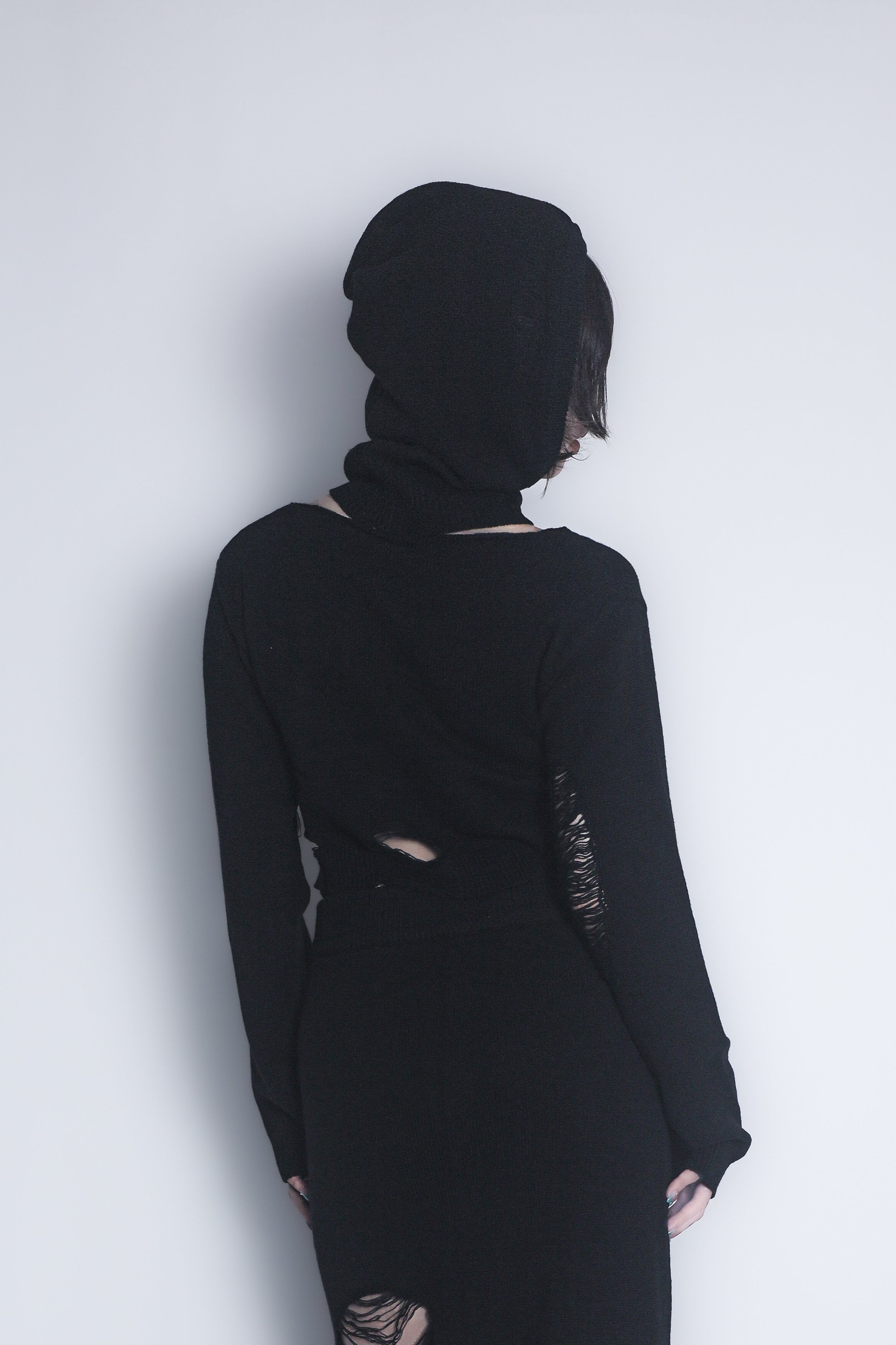 ダメージニットトップス