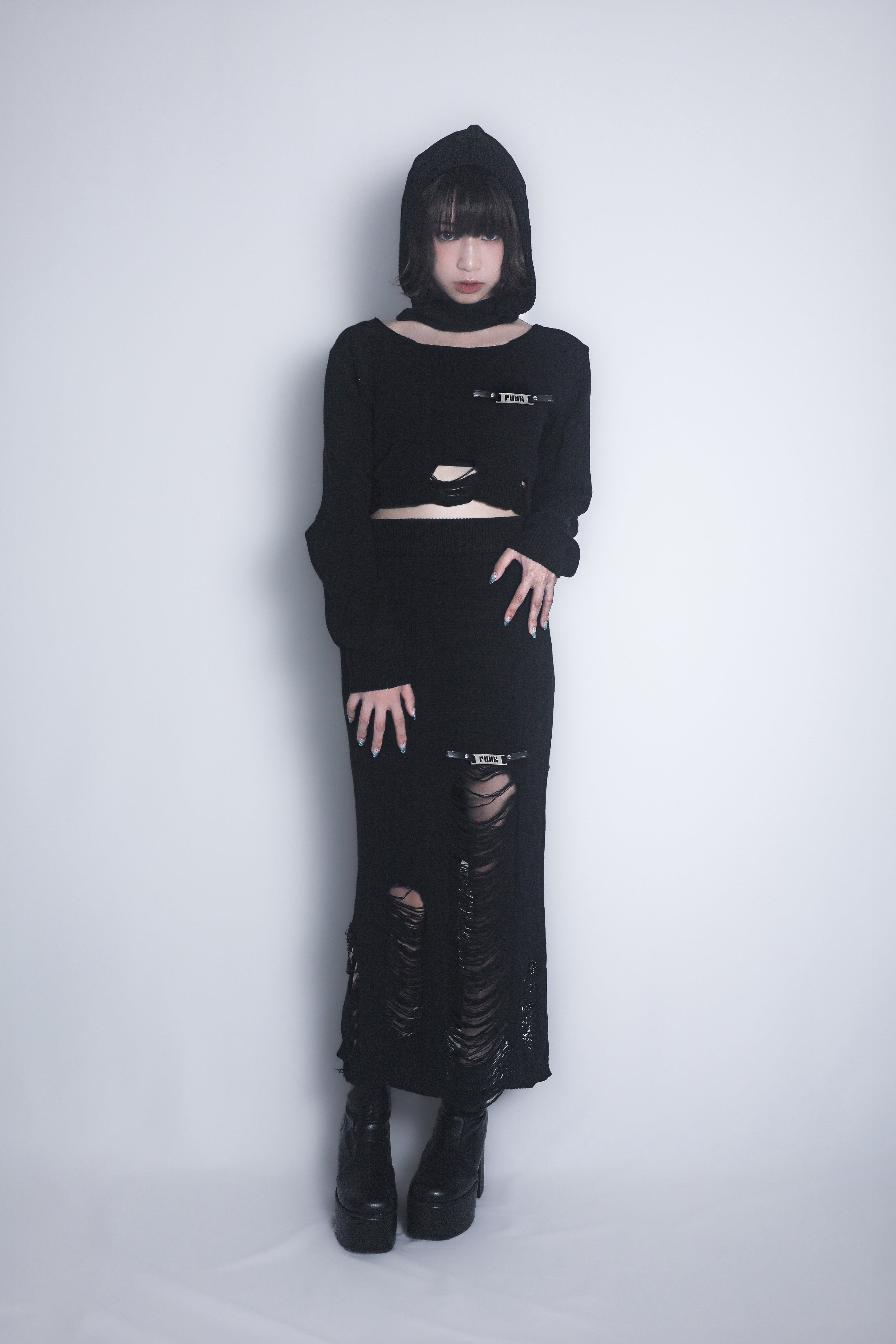 ダメージニットトップス