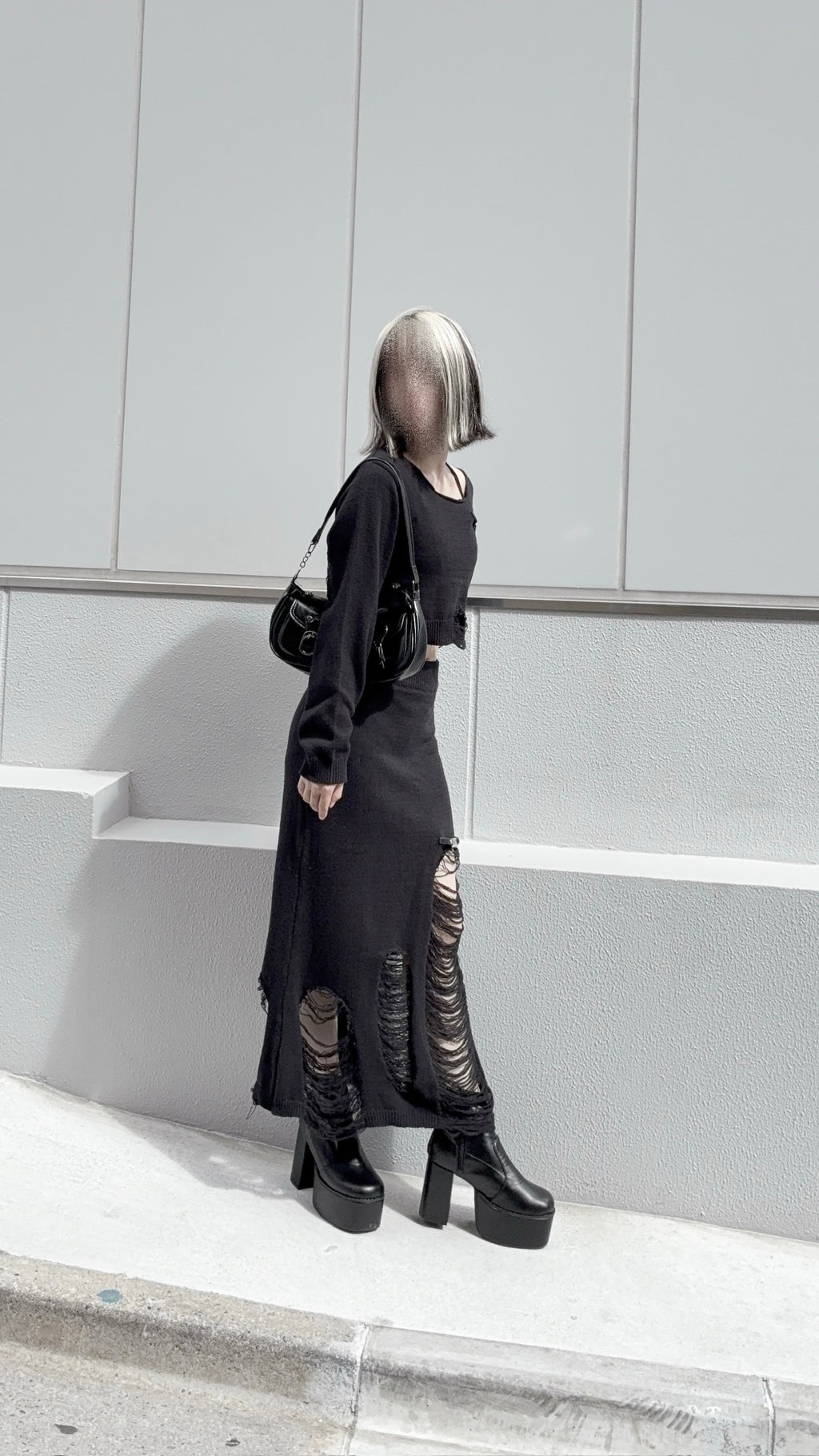 ダメージニットトップス