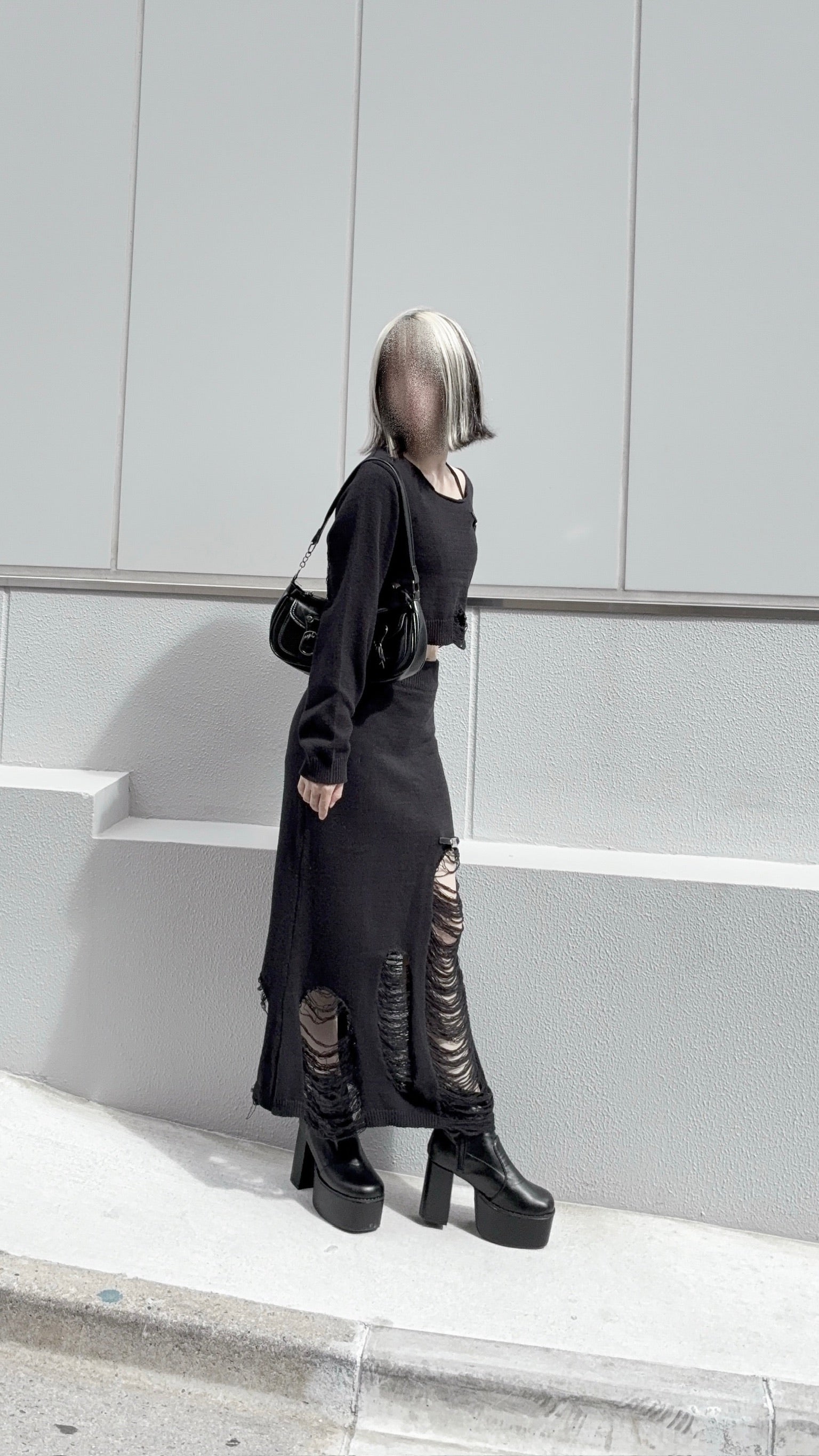 ダメージニットトップス
