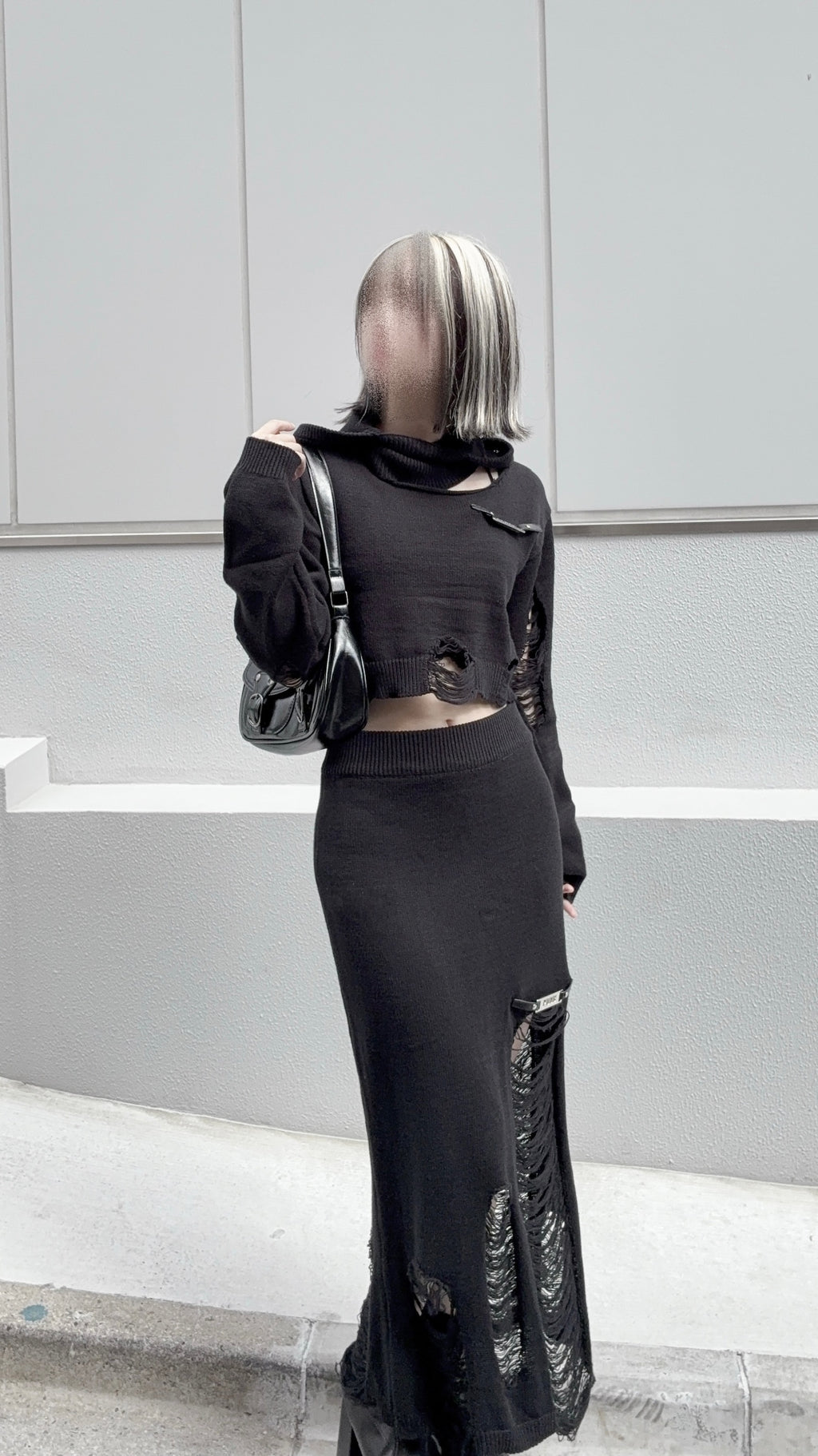 ダメージニットトップス