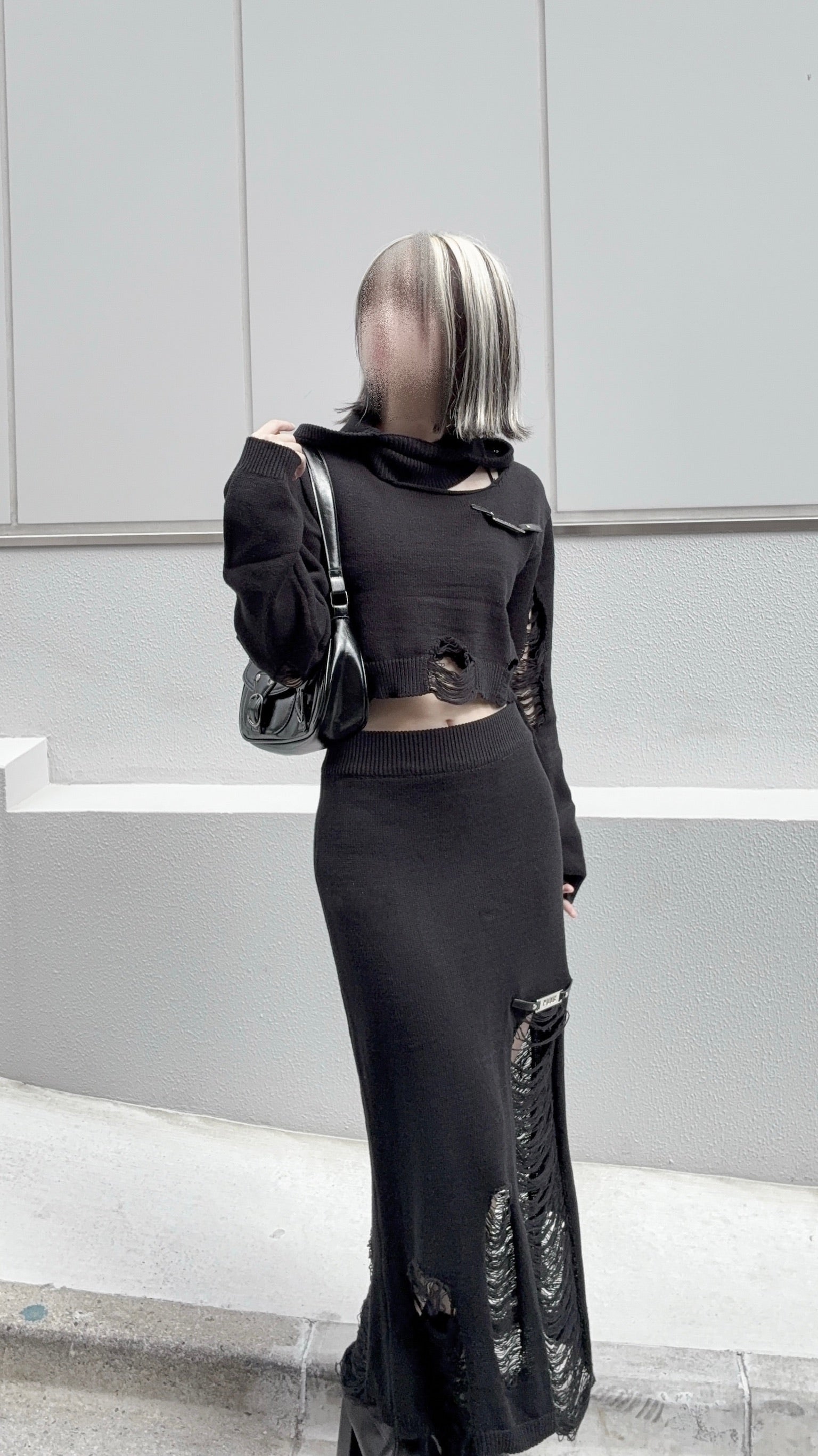 ダメージニットトップス